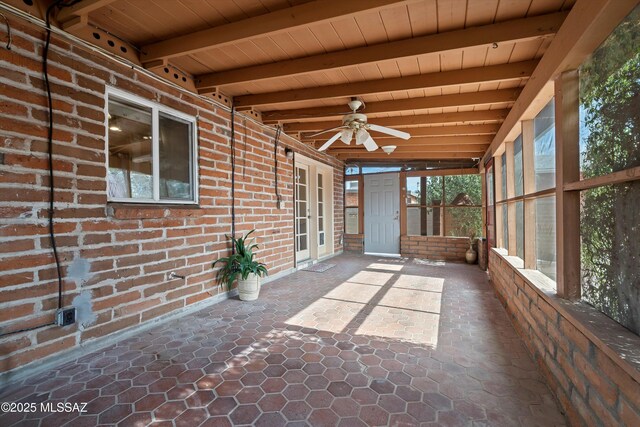 1709 S Avenida Sirio, Tucson, AZ 85710 - unfurnished sunroom featuring beamed ceiling and ceiling fan