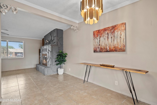 1709 S Avenida Sirio, Tucson, AZ 85710 - unfurnished living room with ornamental molding, a stone fireplace, a textured ceiling, tile patterned floors, and a chandelier