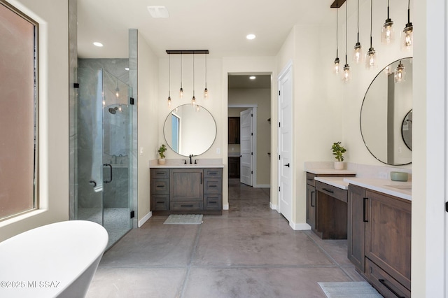 976 W Las Lomitas Rd, Tucson, AZ 85704 - bathroom featuring a stall shower, concrete floors, vanity, a freestanding bath, and recessed lighting