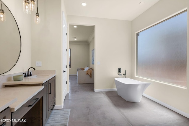 976 W Las Lomitas Rd, Tucson, AZ 85704 - full bath with concrete floors, vanity, a freestanding tub, and recessed lighting