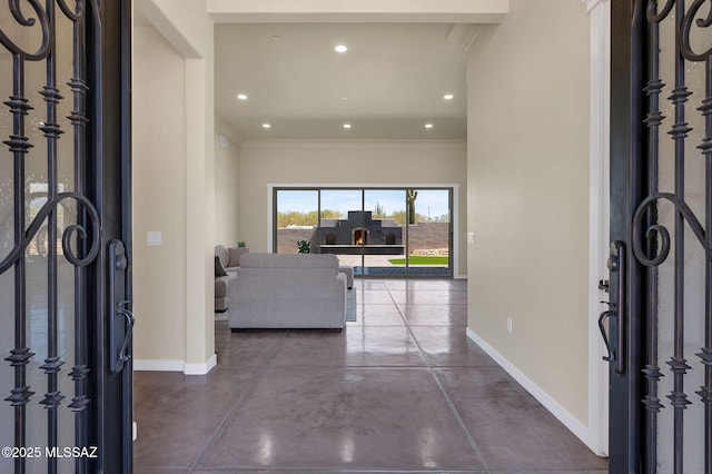 976 W Las Lomitas Rd, Tucson, AZ 85704 - foyer with concrete flooring, crown molding, and recessed lighting