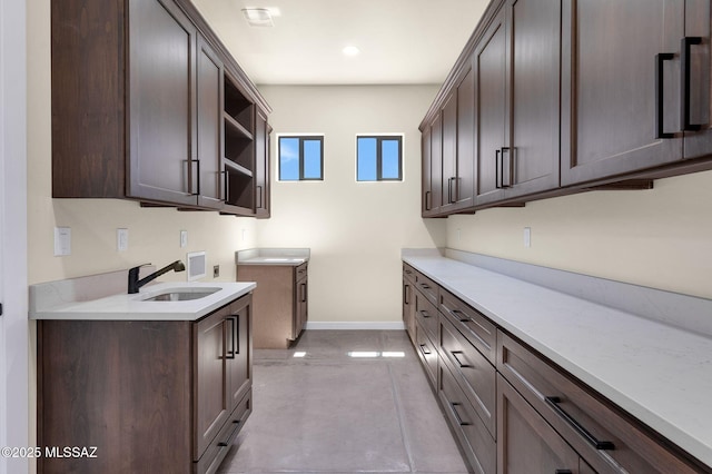 976 W Las Lomitas Rd, Tucson, AZ 85704 - laundry room featuring cabinet space, hookup for a washing machine, and recessed lighting