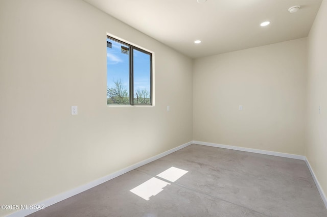 976 W Las Lomitas Rd, Tucson, AZ 85704 - spare room featuring finished concrete floors, recessed lighting, and a smoke detector