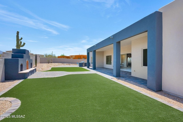 976 W Las Lomitas Rd, Tucson, AZ 85704 - fenced backyard featuring a patio area