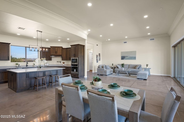 976 W Las Lomitas Rd, Tucson, AZ 85704 - dining room featuring recessed lighting and crown molding