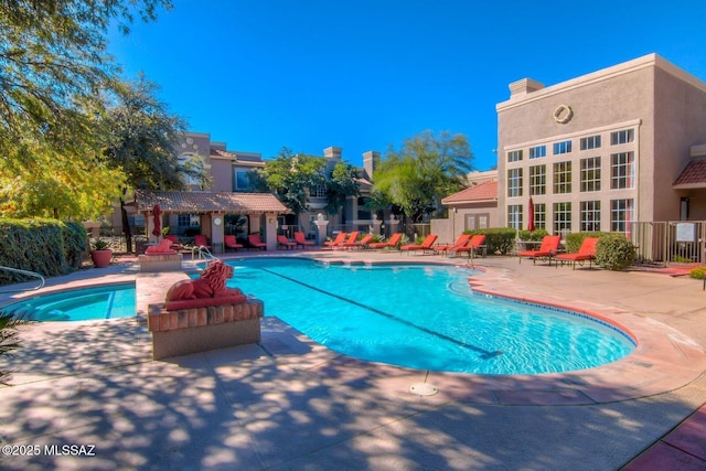 1500 E Pusch Wilderness Dr Unit 10106, Tucson, AZ 85737 - community pool with a patio