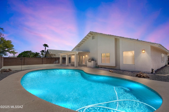 1562 W Via De Chapala, Sahuarita, AZ 85629 - view of swimming pool featuring a patio and a fenced backyard