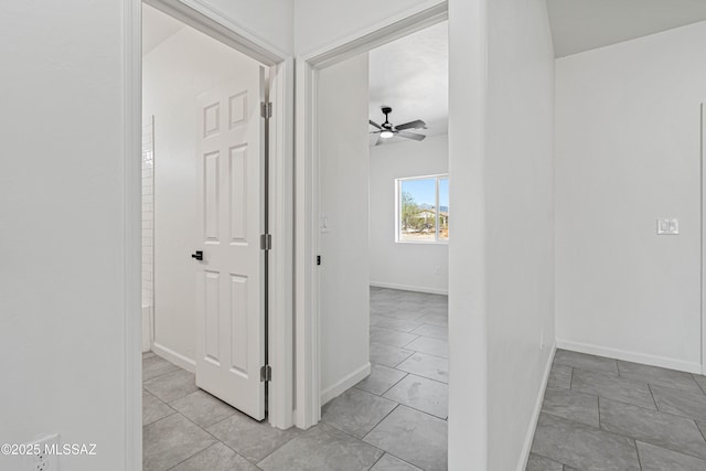 1844 Burns Ct, Rio Rico, AZ 85648 - corridor featuring baseboards and light marble finish floors