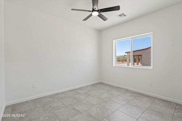 1844 Burns Ct, Rio Rico, AZ 85648 - empty room featuring ceiling fan and baseboards