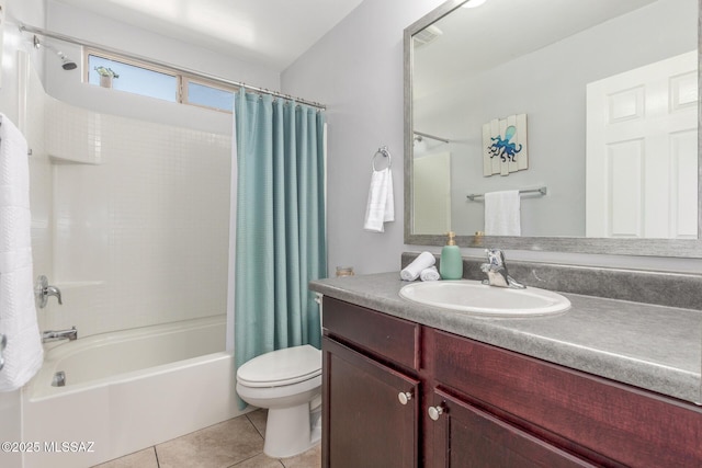8751 W Saguaro Moon Rd, Marana, AZ 85653 - bathroom with shower / bath combination with curtain, vanity, tile patterned flooring, and toilet