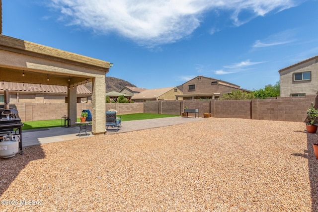 8751 W Saguaro Moon Rd, Marana, AZ 85653 - fenced backyard with a patio area