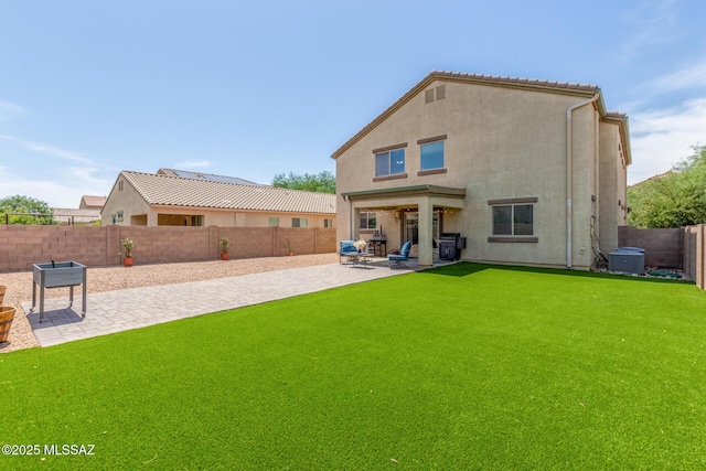 8751 W Saguaro Moon Rd, Marana, AZ 85653 - rear view of house featuring a patio, stucco siding, and central AC