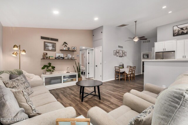 4522 W Vander Bie Pl, Tucson, AZ 85741 - living room featuring dark wood-type flooring, a ceiling fan, high vaulted ceiling, baseboards, and recessed lighting