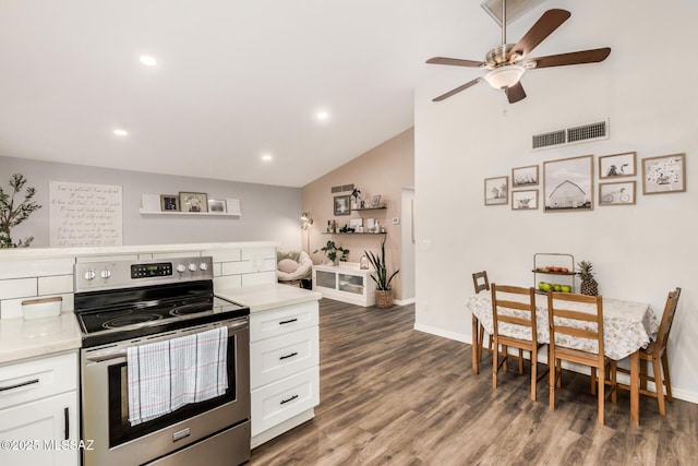 4522 W Vander Bie Pl, Tucson, AZ 85741 - kitchen featuring stainless steel range with electric cooktop, ceiling fan, light countertops, white cabinetry, and vaulted ceiling