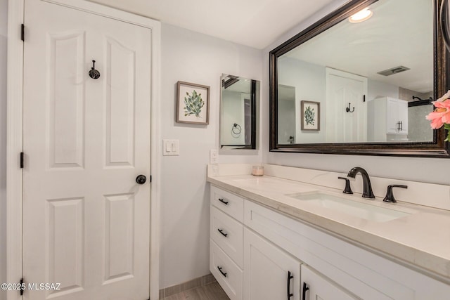4522 W Vander Bie Pl, Tucson, AZ 85741 - bathroom with vanity and baseboards