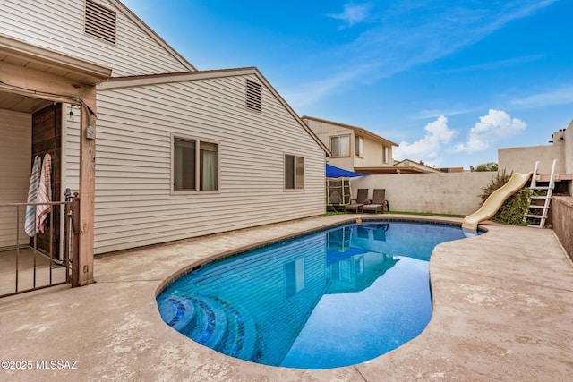 4522 W Vander Bie Pl, Tucson, AZ 85741 - view of swimming pool with a water slide and a patio
