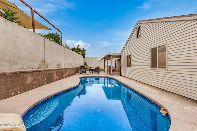 4522 W Vander Bie Pl, Tucson, AZ 85741 - view of swimming pool featuring a patio and a fenced backyard