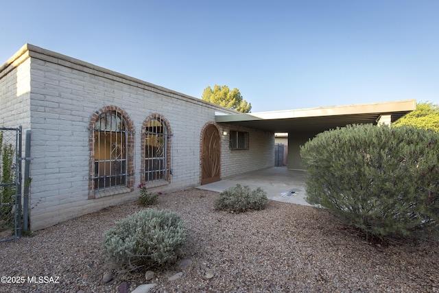 4557 E San Francisco Blvd, Tucson, AZ 85712 - view of front of house with brick siding
