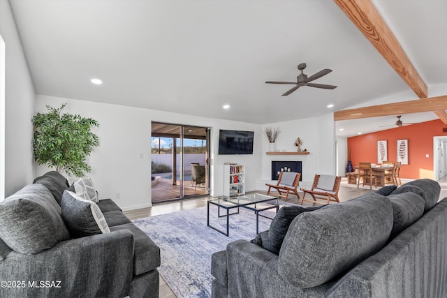 835 E Camino De Fray Marcos, Tucson, AZ 85718 - living room featuring a ceiling fan, recessed lighting, wood finished floors, a fireplace, and baseboards