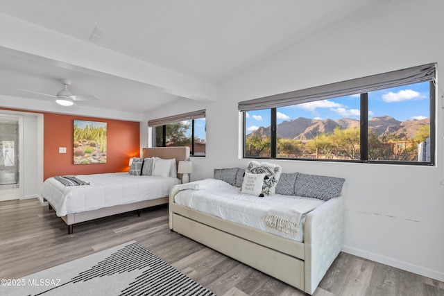 835 E Camino De Fray Marcos, Tucson, AZ 85718 - bedroom featuring wood finished floors and baseboards