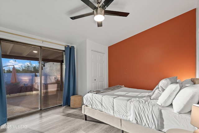 835 E Camino De Fray Marcos, Tucson, AZ 85718 - bedroom featuring wood finished floors, access to outside, and ceiling fan