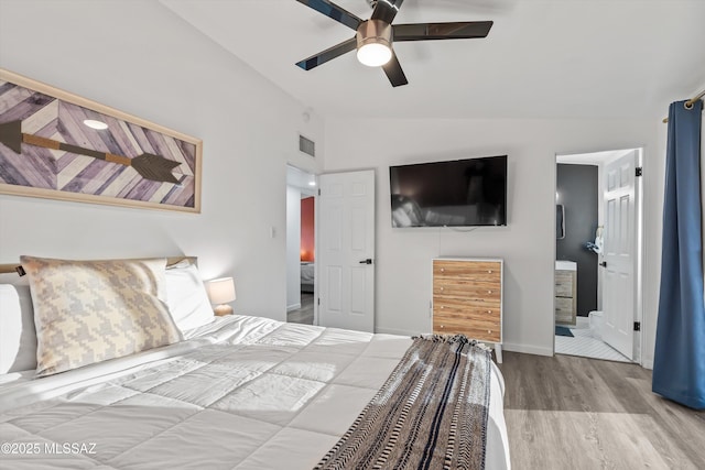 835 E Camino De Fray Marcos, Tucson, AZ 85718 - bedroom featuring lofted ceiling, wood finished floors, ceiling fan, and baseboards