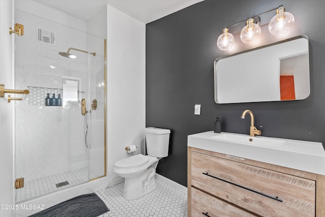 835 E Camino De Fray Marcos, Tucson, AZ 85718 - full bathroom with toilet, vanity, a shower stall, baseboards, and tile patterned flooring