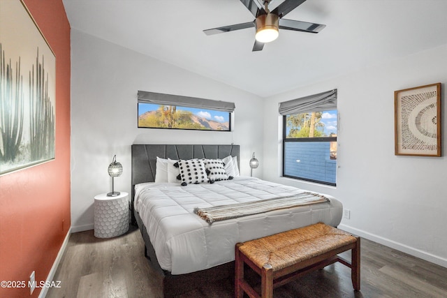 835 E Camino De Fray Marcos, Tucson, AZ 85718 - bedroom with wood finished floors, vaulted ceiling, baseboards, and ceiling fan