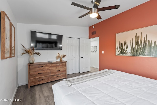 835 E Camino De Fray Marcos, Tucson, AZ 85718 - bedroom featuring wood finished floors, lofted ceiling, baseboards, a closet, and a ceiling fan
