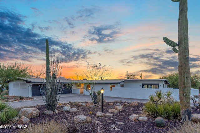 835 E Camino De Fray Marcos, Tucson, AZ 85718 - mid-century inspired home with driveway and an attached garage