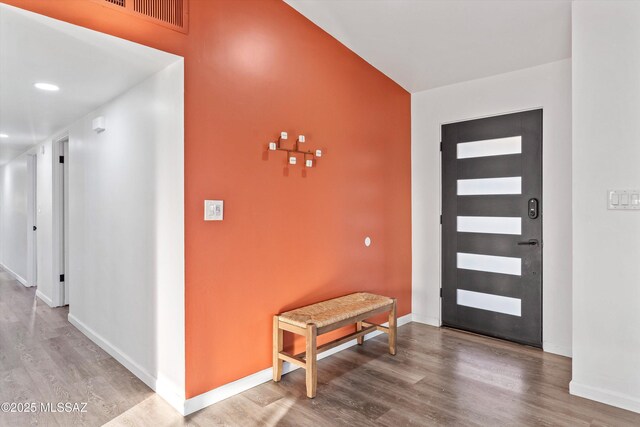 835 E Camino De Fray Marcos, Tucson, AZ 85718 - entryway with wood finished floors and baseboards