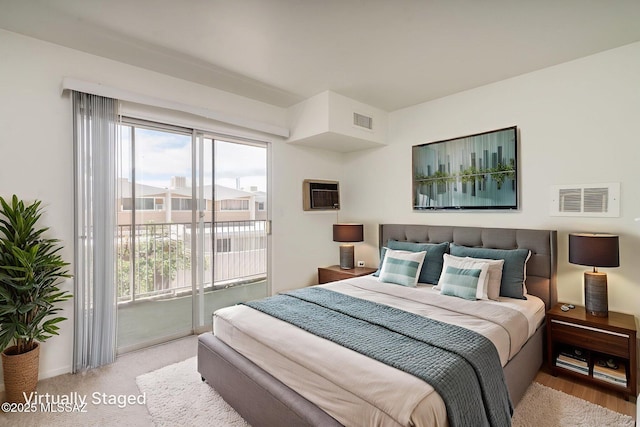 1470 S Palo Verde Ave Unit J 201, Tucson, AZ 85713 - bedroom with access to outside and an AC wall unit