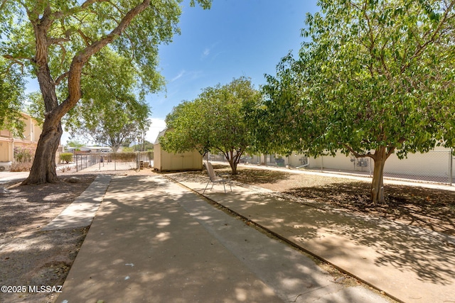 1470 S Palo Verde Ave Unit J 201, Tucson, AZ 85713 - view of property hidden behind natural elements featuring a patio