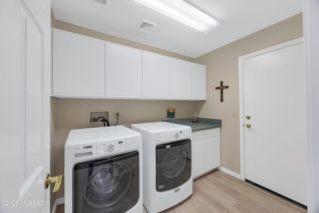 37671 S Hill Side Dr, Tucson, AZ 85739 - laundry area featuring cabinet space, washer and dryer, light wood-style floors, and baseboards