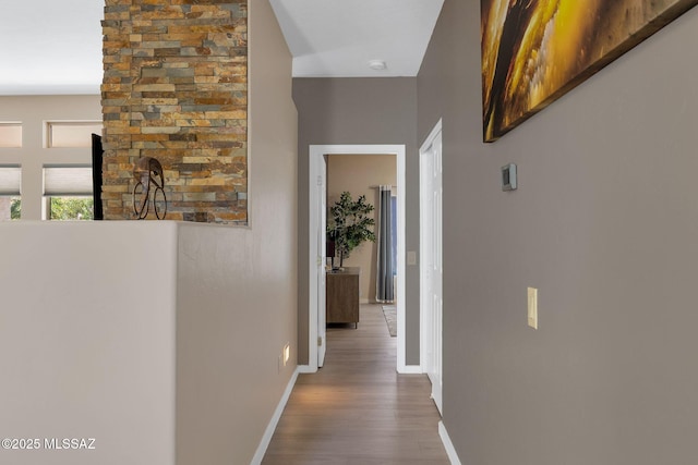 37671 S Hill Side Dr, Tucson, AZ 85739 - hallway featuring wood finished floors and baseboards