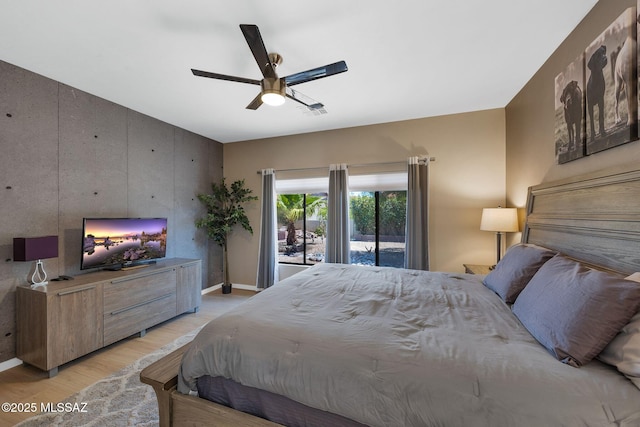 37671 S Hill Side Dr, Tucson, AZ 85739 - bedroom featuring light wood-style flooring, access to outside, ceiling fan, and baseboards