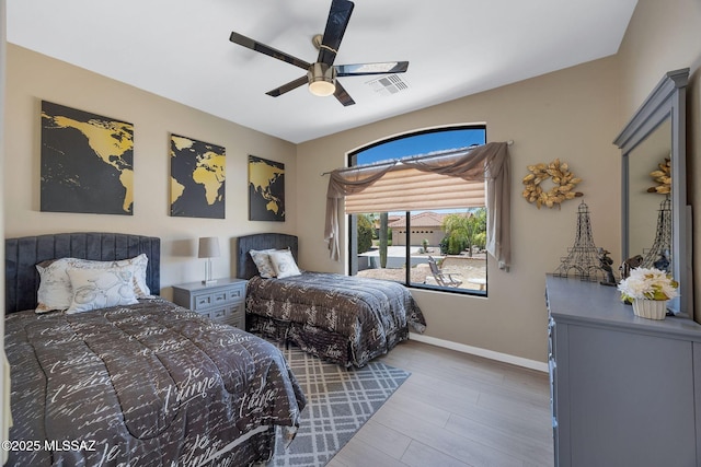 37671 S Hill Side Dr, Tucson, AZ 85739 - bedroom featuring wood finished floors, baseboards, and ceiling fan