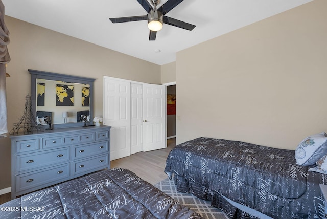 37671 S Hill Side Dr, Tucson, AZ 85739 - bedroom featuring wood finished floors, ceiling fan, and a closet