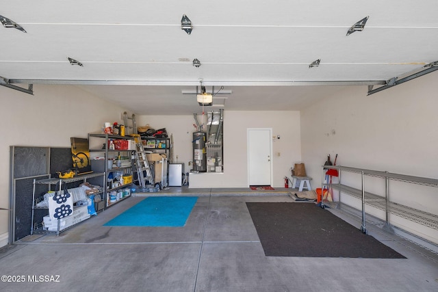 37671 S Hill Side Dr, Tucson, AZ 85739 - garage featuring gas water heater and a garage door opener