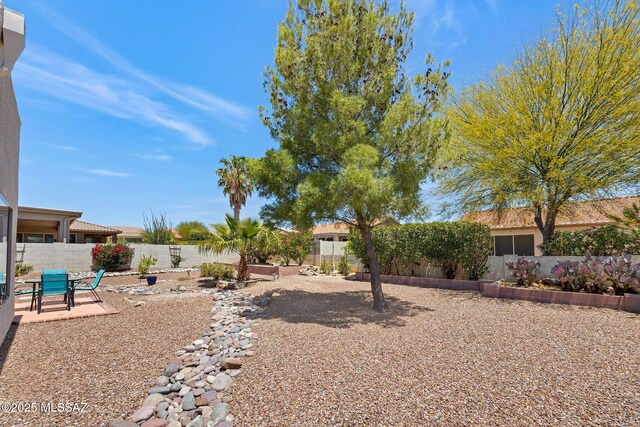 37671 S Hill Side Dr, Tucson, AZ 85739 - fenced backyard with a patio area