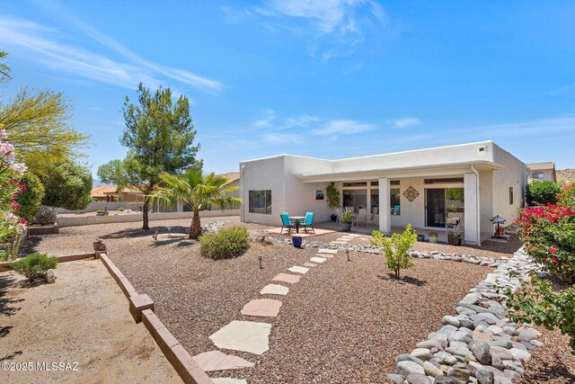 37671 S Hill Side Dr, Tucson, AZ 85739 - rear view of property with stucco siding and a patio area