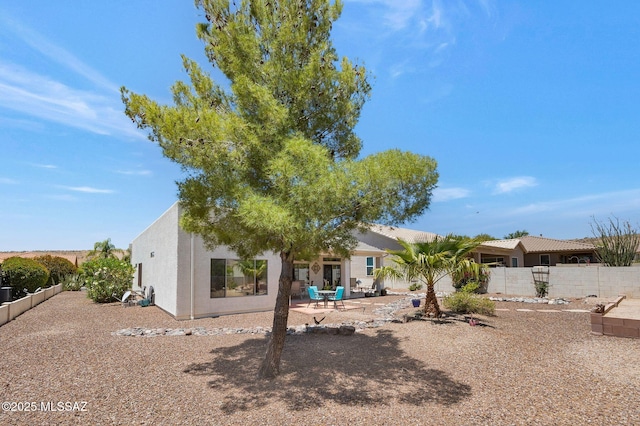 37671 S Hill Side Dr, Tucson, AZ 85739 - back of house with a patio and stucco siding