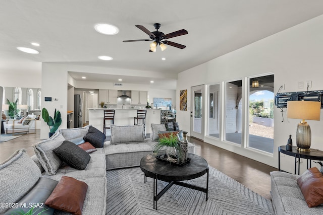 6355 N Camino De Santa Valera, Tucson, AZ 85718 - living room featuring ceiling fan, recessed lighting, and wood finished floors