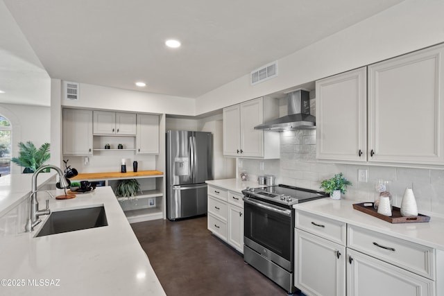 6355 N Camino De Santa Valera, Tucson, AZ 85718 - kitchen featuring stainless steel appliances, wall chimney range hood, a sink, light countertops, and recessed lighting