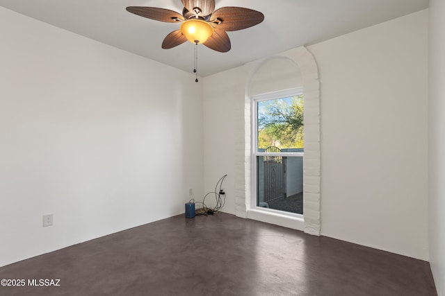 6355 N Camino De Santa Valera, Tucson, AZ 85718 - unfurnished room featuring finished concrete flooring and a ceiling fan