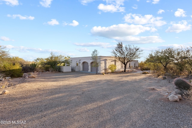 6355 N Camino De Santa Valera, Tucson, AZ 85718 - view of front of home with dirt driveway and an attached garage
