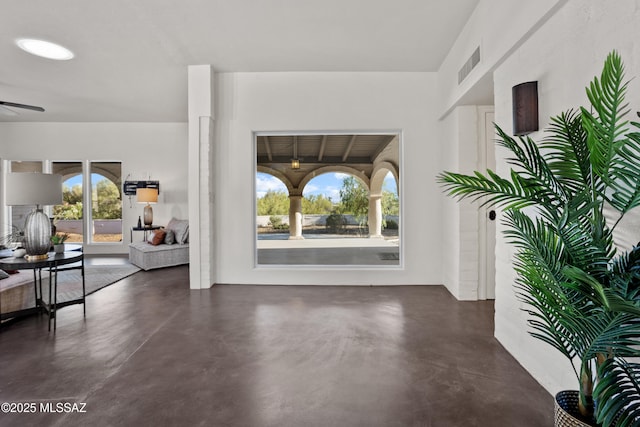 6355 N Camino De Santa Valera, Tucson, AZ 85718 - entrance foyer featuring plenty of natural light, concrete floors, and a ceiling fan