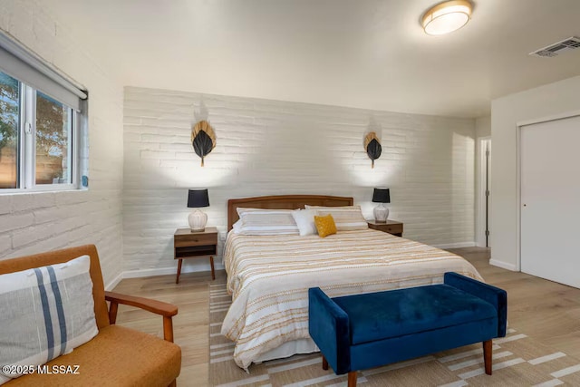 5601 E Baker St, Tucson, AZ 85711 - bedroom with wood finished floors and baseboards