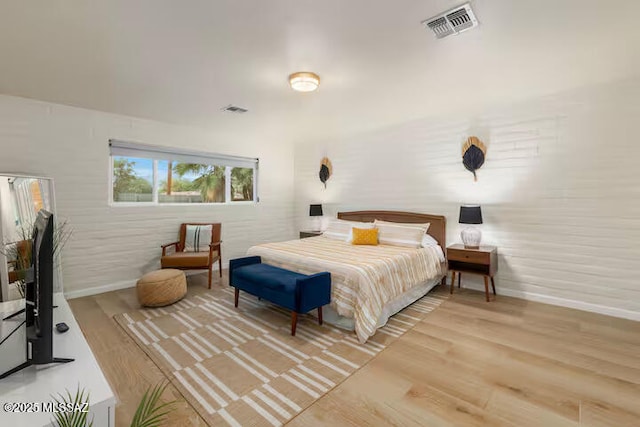 5601 E Baker St, Tucson, AZ 85711 - bedroom with baseboards and wood finished floors