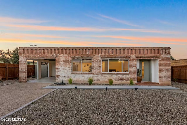 5601 E Baker St, Tucson, AZ 85711 - view of front of house featuring brick siding